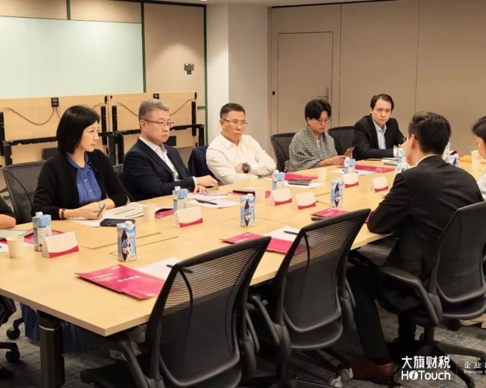 广州市商务局局长魏敏一行在大旗财税新加坡公司调研